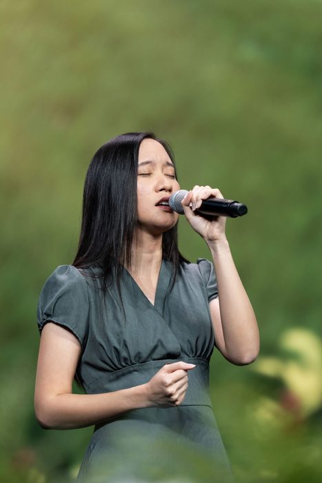 Sabrina Hew performing on stage